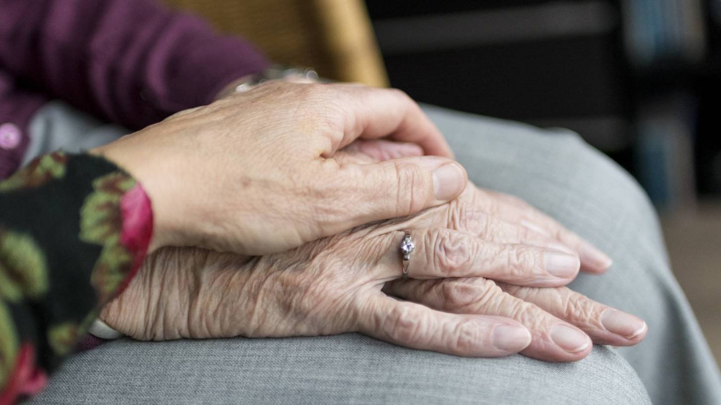 holding hands with an older relative