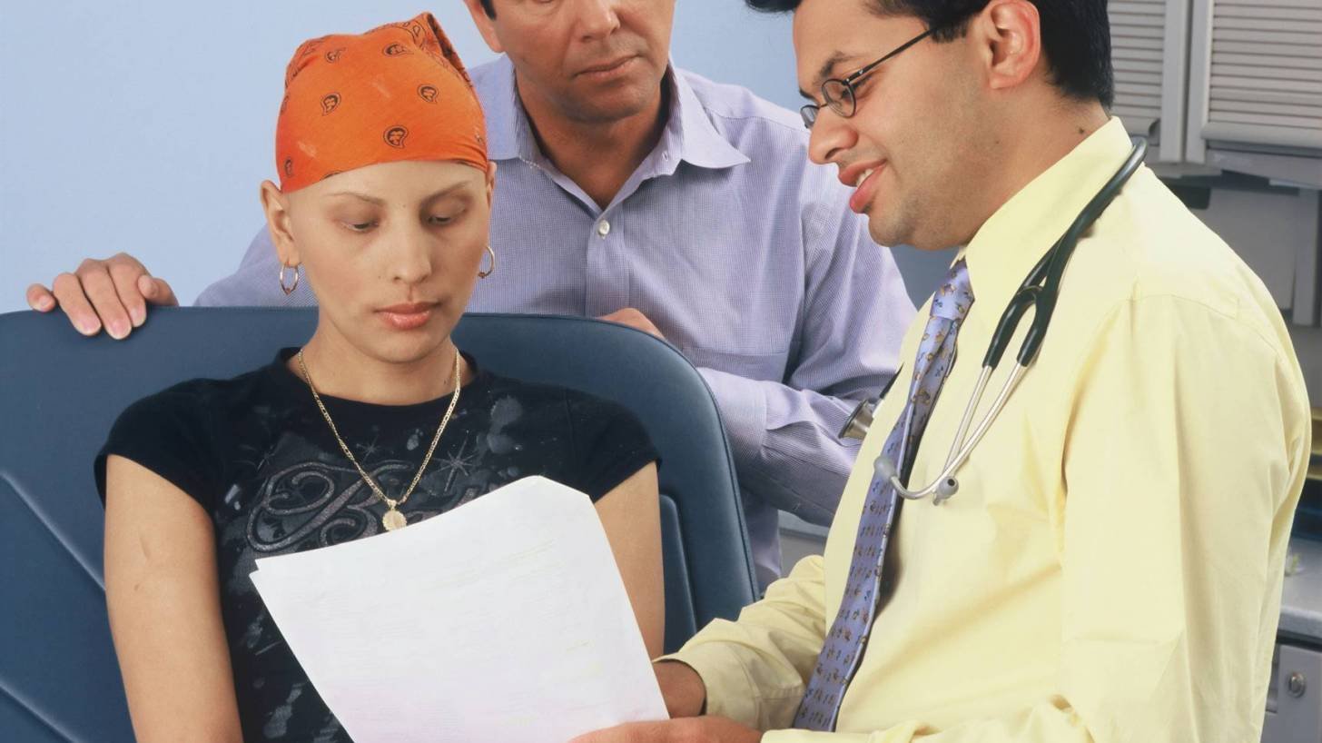 doctor and patient talking over treatments