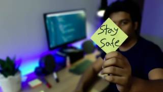 home worker showing stay safe sign