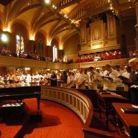 inside a church of worship with people praying